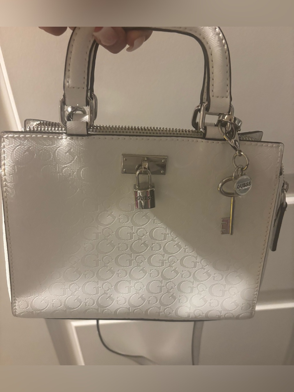 GUESS White Embossed Logo Satchel with Gold Padlock Charm